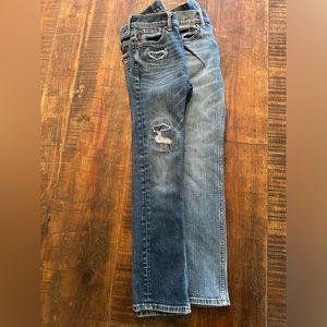 2 Pairs of Biys 11/12 Abercrombie Jeans in good condition.